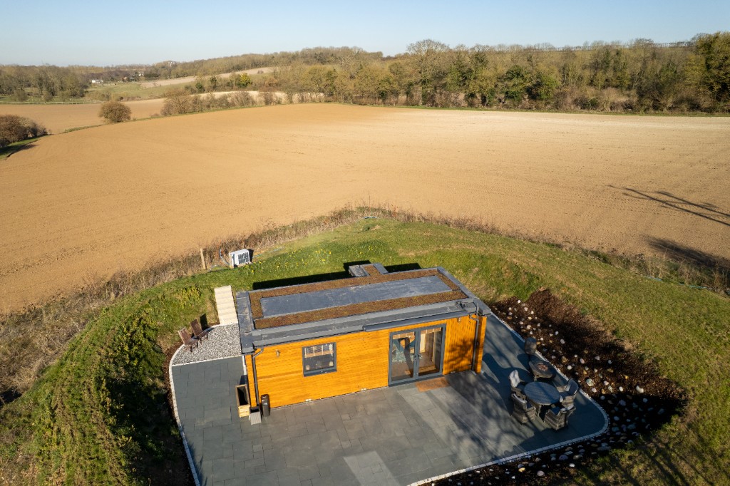 Aerial view of an Enchanted Lodge among the Kent countryside
